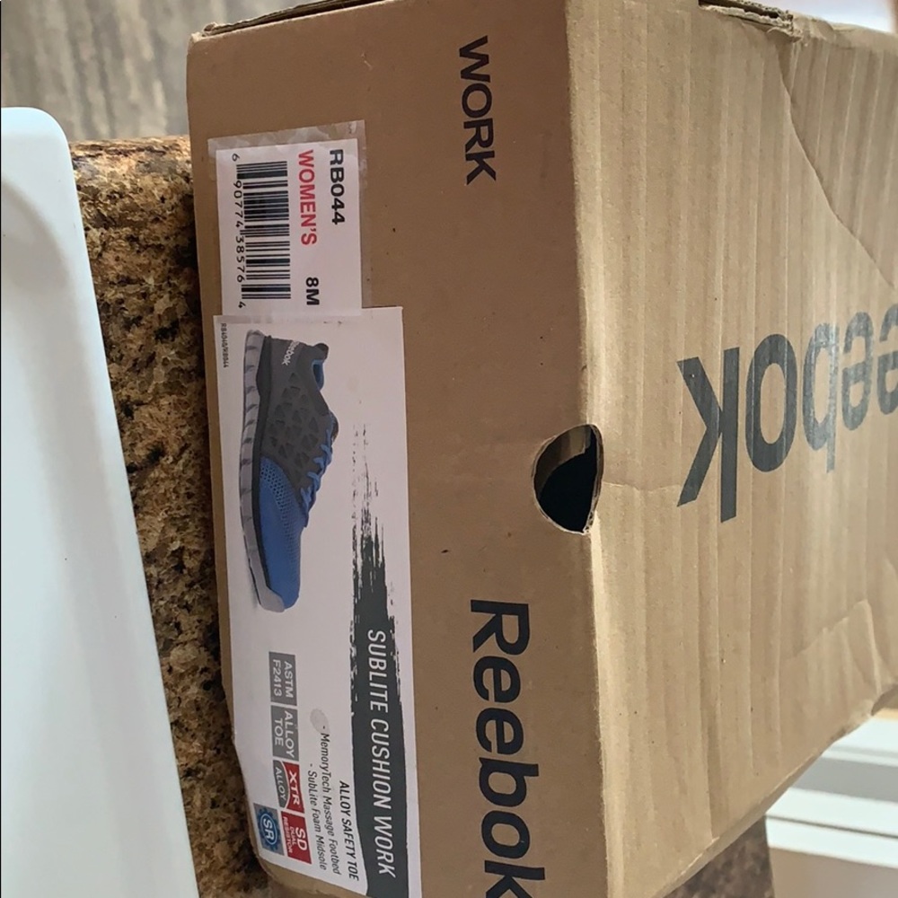 Steel toed women’s Reebok tennis shoes!